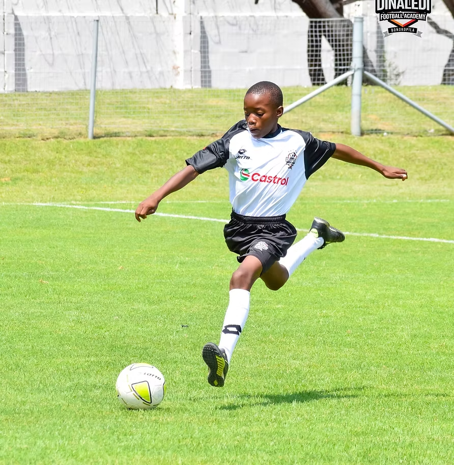 Dinaledi player striking the ball in training